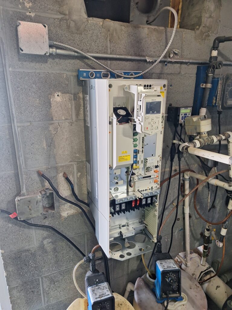 Elsmar Air technician checking for a refrigerant leak in Sunrise