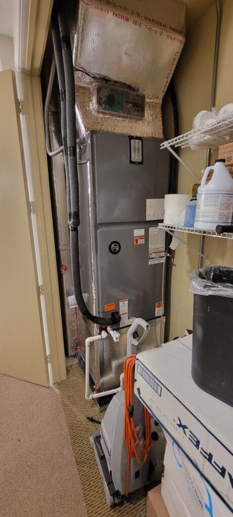 Installed indoor air handler connected to insulated ductwork